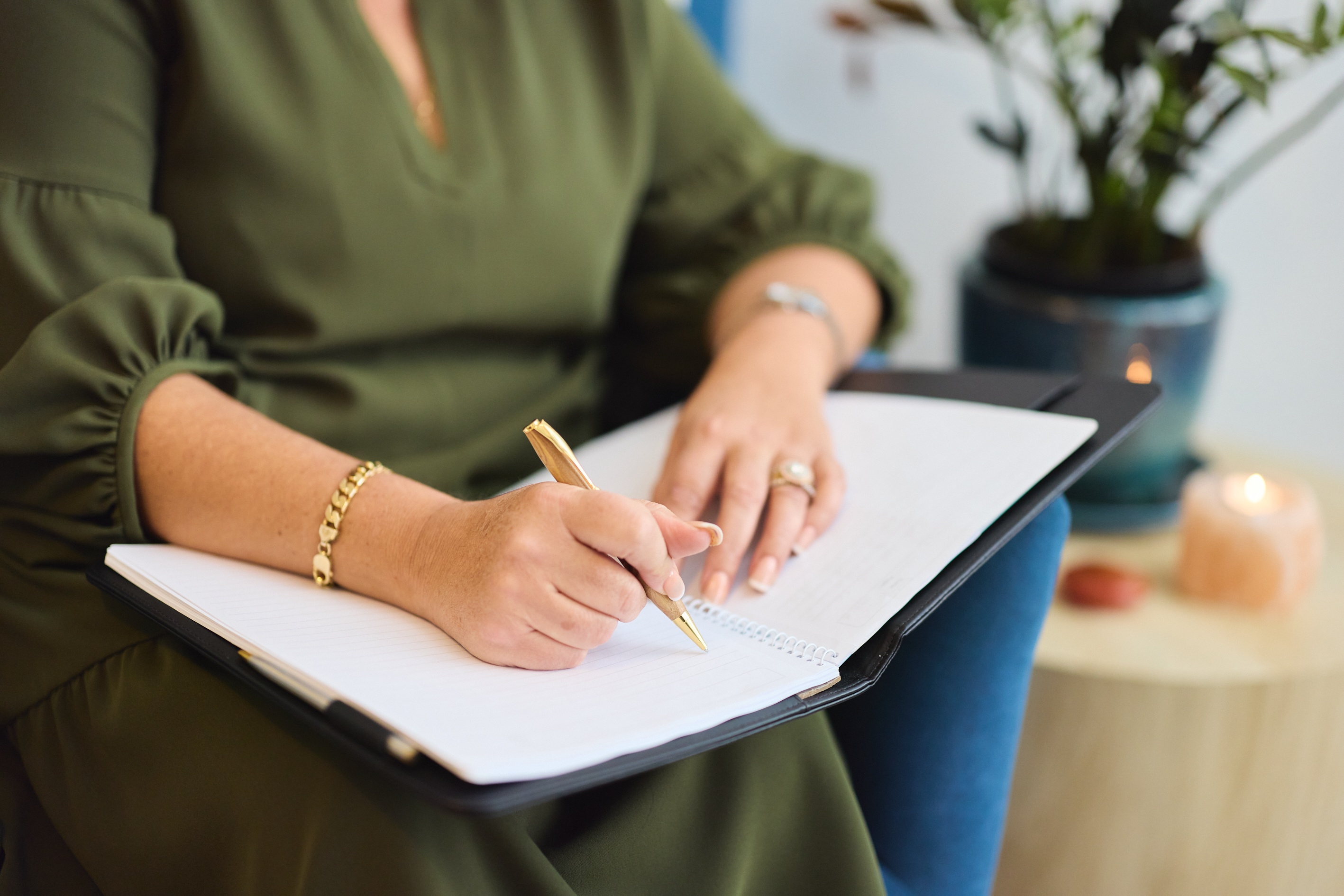 Counselling by Krasna writing notes in book